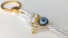 Picture of 10 pcs Keychain Baptism favors gold cross evil eye